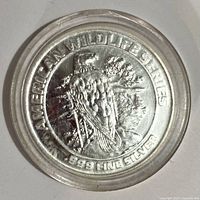 Obverse showing eagle and wildlife series text
