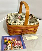 Basket with liner, protector, brochure and plastic bag displayed
