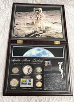 Closed and opened wooden case showing entire collection layout