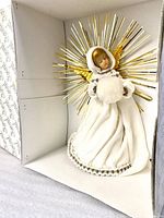 Angel tree topper in box interior showing details