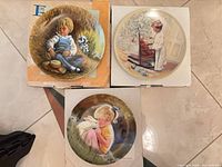 All three John McClelland Mother Goose plates on original boxes