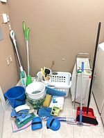 Wide shot of entire lot showing all cleaning tools and supplies