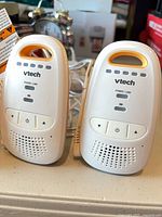 Front view of two VTech DM111 monitor units