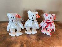 Front view of Bride, Groom and Smooch bears with tags visible