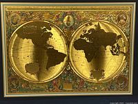 Full view of gold metallic double hemisphere world map print