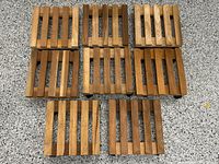 All eight wood rolling plant stands displayed top view