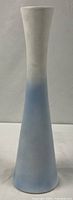 Full view of tall vase with white to blue gradient