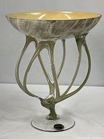 Full view of Jozefina art glass compote showing bowl, openwork stem and foot with label