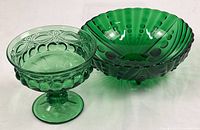 Compote and footed bowl side by side