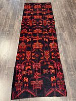 Full view of entire rug laid on wood floor