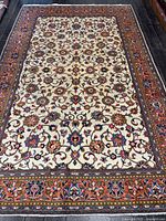 Full view of rug showing overall design and borders