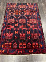 Full view of rug showing entire design and fringe