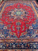 Full view of entire rug showing pattern and borders