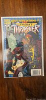 Front cover of Night Thrasher #8 in bag and board
