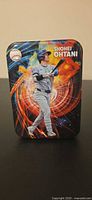 Front view showing Shohei Ohtani artwork on lid
