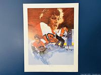 Full front view of entire Bob Clarke signed print against blue wall