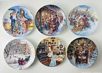 All six decorative holiday plates laid out