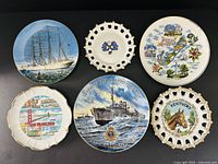 Group image of all six plates arranged, showing fronts and designs