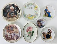 Overview of all seven decorative plates