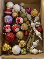 Overview of assorted ornaments in box