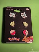 Front view of display card showing all three earring pairs