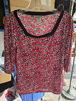 Front view of patterned Jones & Co top on hanger