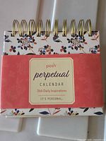 Front view of Posh perpetual calendar with band