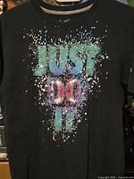 Front view showing "JUST DO IT" graphic