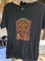 Front view of T-shirt showing full graphic and condition