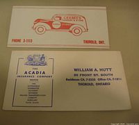 Fronts of both blotters showing graphics and text