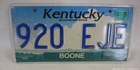 Front of Kentucky license plate showing design, number and decal
