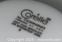 Underside Corelle backstamp showing brand and Corning mark