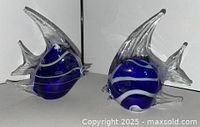Both glass fish figurines side by side front view