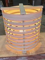 Oak veneer table lamp illuminated