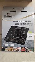 Front of retail box showing Duxtop induction cooktop model 8100MC