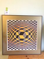 Full view of framed Vasarely print showing entire artwork, mat and frame