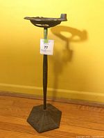 Full view of ashtray stand showing dish, column and base