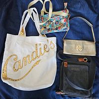 Group shot of all four purses