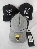 Three hats group shot showing fronts