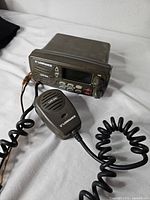 Front view of Lowrance LVR-850 radio with microphone attached