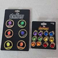 Both carded sets side by side