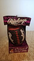 Football in display box front view showing brand and Crazy 8 labeling