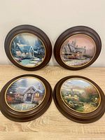Front view of all four framed plates