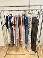 Rack view showing all twelve dresses