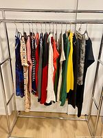 Full rack showing all sixteen garments