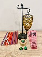 Full lot showing candle holder, taper candles, tealights, wood holder and incense