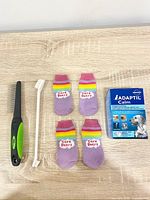 Overview of all items laid out on wood surface