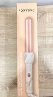 Retail box front showing FoxyBae curling wand