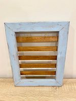 Front view showing frame, slats and overall condition