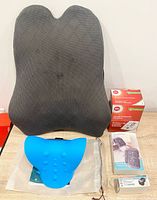 All items overview: back cushion, neck relaxer, blood pressure monitor, XL cuff, pulse oximeter